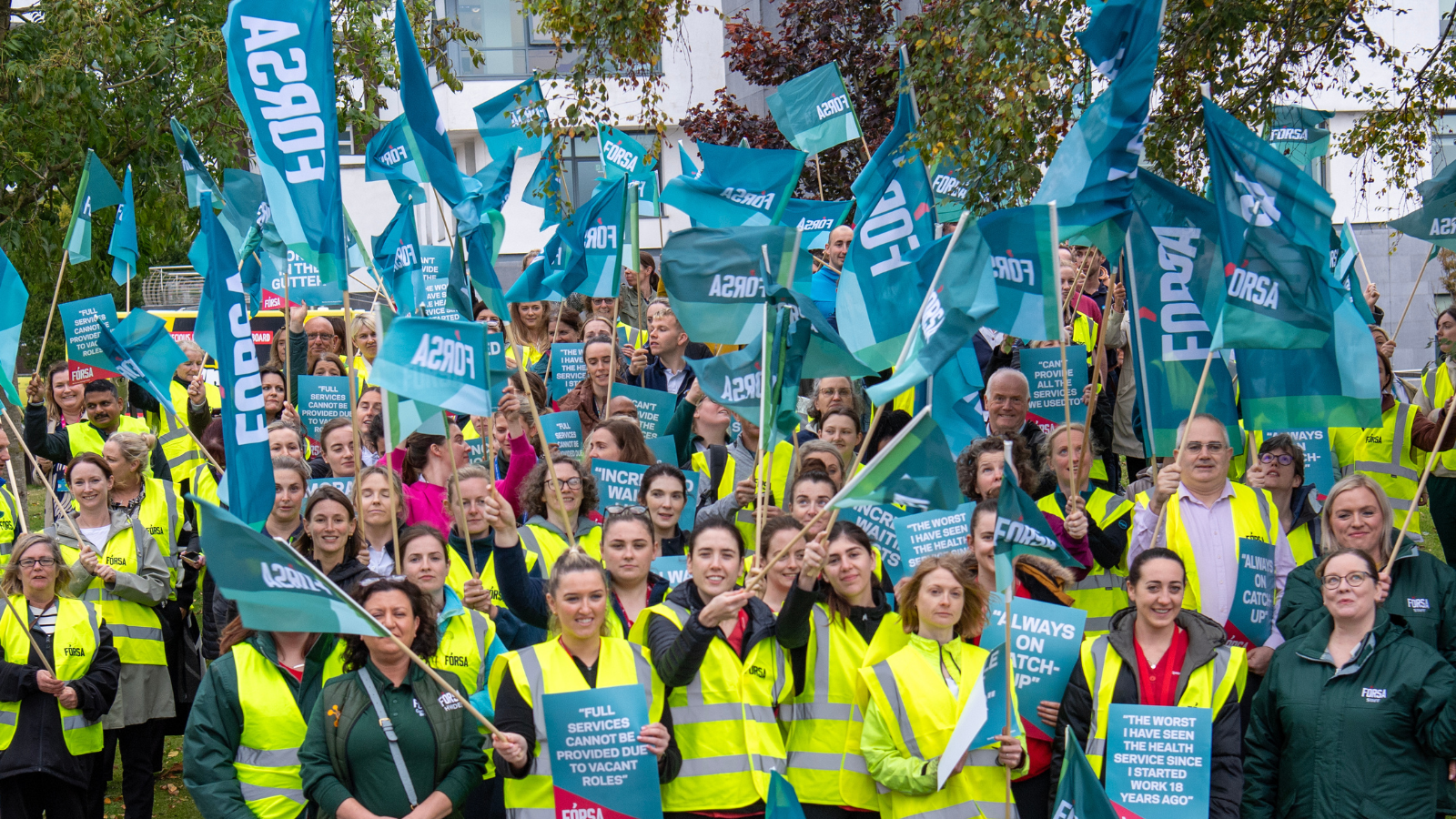 photo of forsa members at a protest with a large amount of flags, to represent our general election manifesto campaign