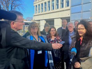 healthcare union reps at the wrc speaking to media