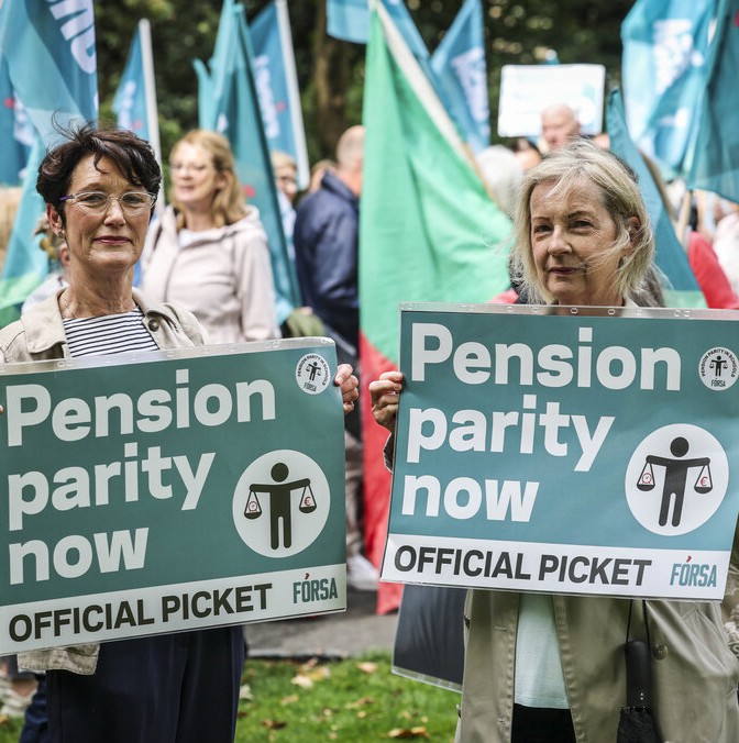 School secretaries Mary Holder and Barbara Gallivan protesting for pension parity at the Department of Public Expenditure